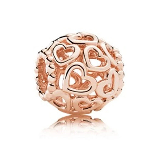 Ροζ χρυσό charm με διάτρητες καρδιές