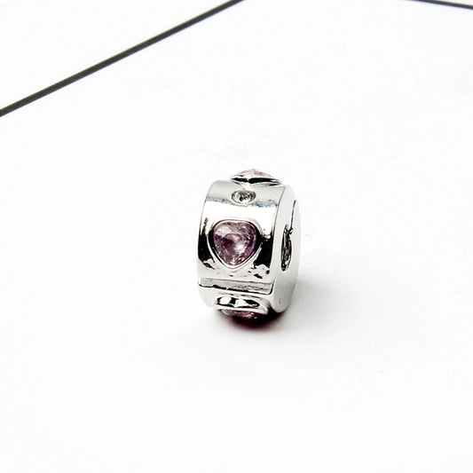 Ασημί γούρι με ροζ καρδιά και κρύσταλλο