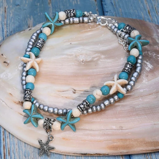 Βραχιόλι ποδιού με charm αστερία και γαλάζιες χάντρες