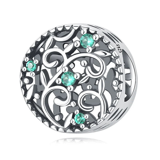 Στρογγυλό ασημένιο charm με πράσινες πέτρες
