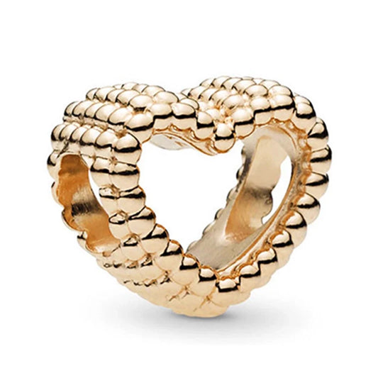 Χρυσαφί charm καρδιά με ανάγλυφη πλεκτή υφή