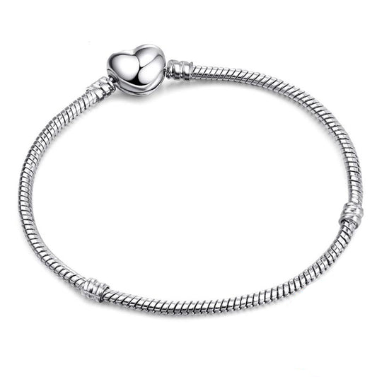 Ασημί βραχιόλι τύπου φίδι με κούμπωμα καρδιά