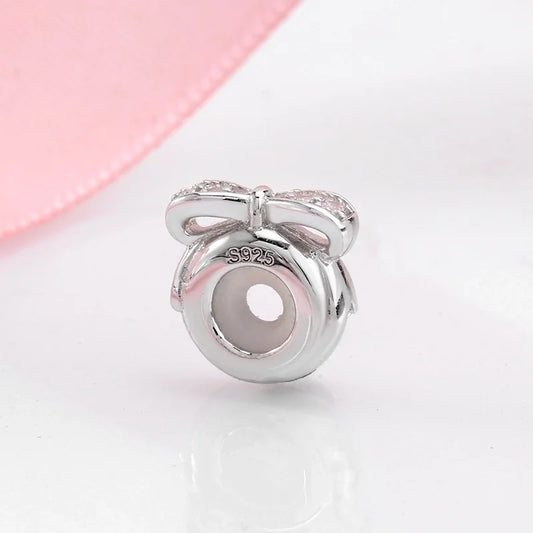 Λαμπερό charm-δώρο με λεπτομέρειες