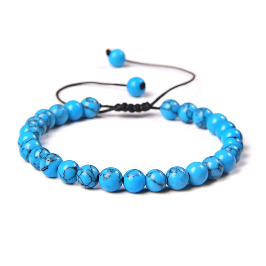 Τυρκουάζ βραχιόλι με χάντρες από φυσική πέτρα και ρυθμιζόμενο κορδόνι.
