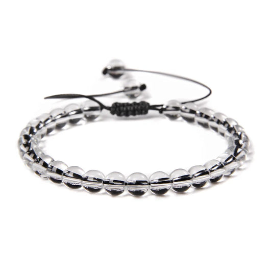 Διάφανο βραχιόλι με κρυστάλλινες χάντρες και ρυθμιζόμενο κορδόνι.