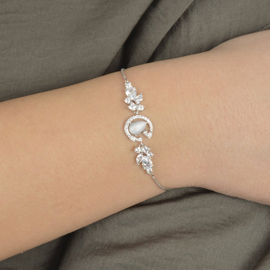 Ασημένιο βραχιόλι με σεληνιακό μοτίβο, ζιργκόν και φίλντισι.