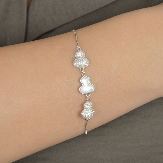 Ασημένιο βραχιόλι με αφαιρετικά σχέδια, φίλντισι και ζιργκόν.