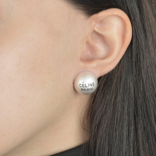 Ασημένια σκουλαρίκια με στρογγυλό σχέδιο και χαραγμένο λογότυπο Céline Paris.