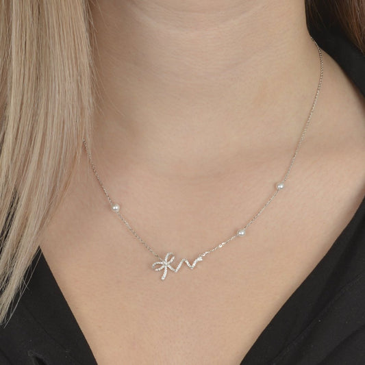 Κολιέ από ασήμι 925 με διακοσμητικό φιόγκο και πέρλες silver jewerly.