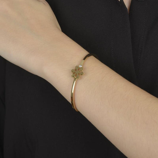 Χρυσό βραχιόλι με διαμαντένια σχέδια και ζιργκόν για μοναδική και αριστοκρατική κομψότητα.