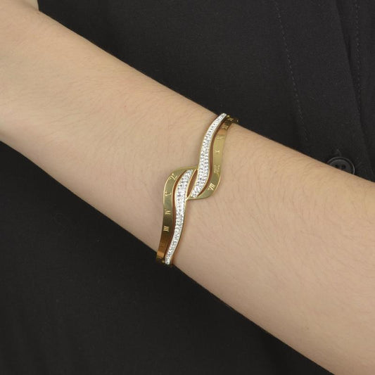 Χρυσό βραχιόλι με ρωμαϊκούς αριθμούς και λαμπερά ζιργκόν για διαχρονική κομψότητα.