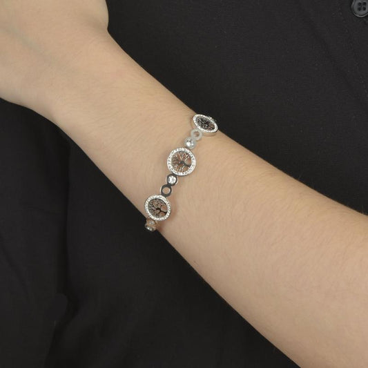 Χρυσό βραχιόλι με στρογγυλές πέτρες και αλυσίδα για μοντέρνο και εκλεπτυσμένο στυλ.