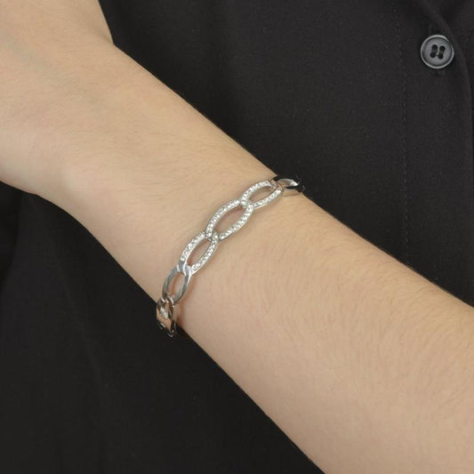 Βραχιόλι σε ασημί τόνο με κομψές καμπύλες και λαμπερές πέτρες