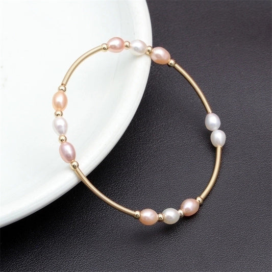 Χρυσό βραχιόλι με ροζ και λευκές πέρλες