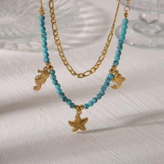 Κολιέ διπλής αλυσίδας με τιρκουάζ χάντρες, αστερία, ιππόκαμπο και δελφίνι