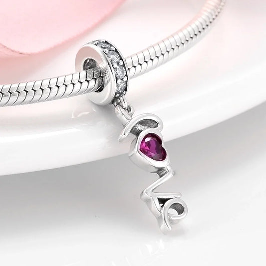 Κρεμαστό charm με λέξη love και καρδούλα από πέτρα