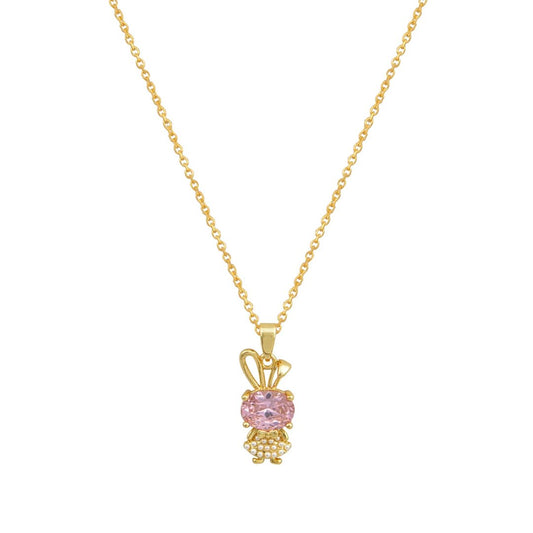 Χρυσό κολιέ με μενταγιόν κουνελάκι και ροζ πέτρα.