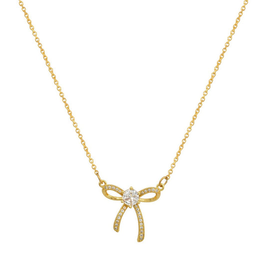 Χρυσό κολιέ με μενταγιόν φιόγκο στολισμένο με ζιργκόν.