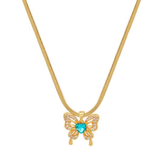 Χρυσό κολιέ με πεταλούδα και γαλάζια πέτρα σε σχήμα καρδιάς από ζιργκόν.