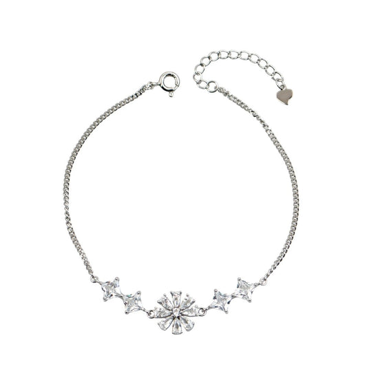 Ασημένιο βραχιόλι με λουλούδι ζιργκόν και διακριτική αλυσίδα.
