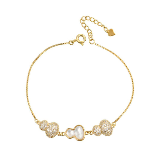 Χρυσό βραχιόλι με μαργαριταρένιο σχέδιο και λαμπερά ζιργκόν.