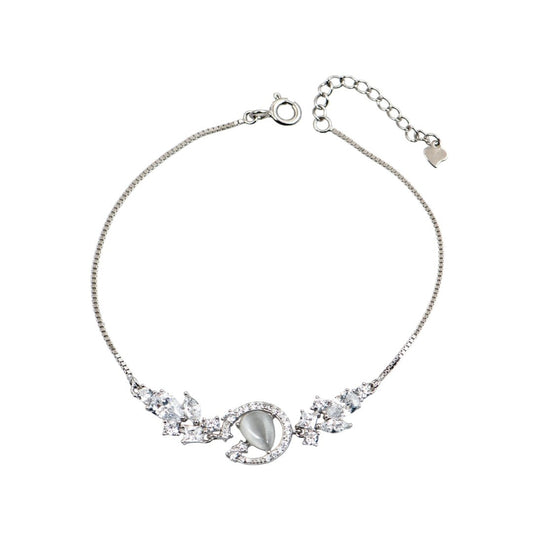 Ασημένιο βραχιόλι με σεληνιακό μοτίβο, ζιργκόν και φίλντισι.