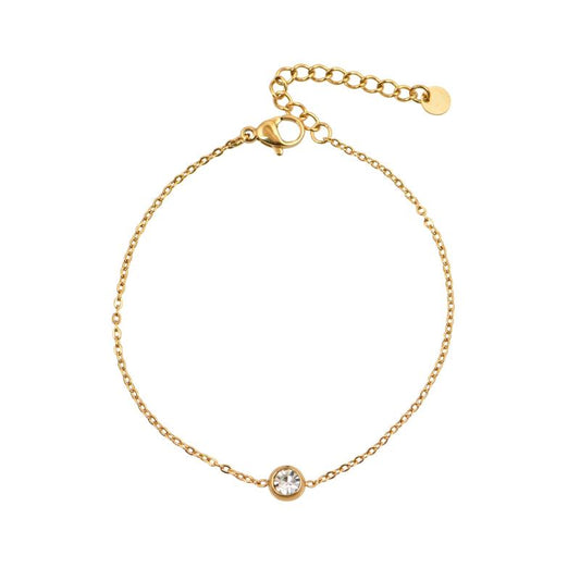 Χρυσό βραχιόλι με λεπτή αλυσίδα και διακριτική πέτρα.