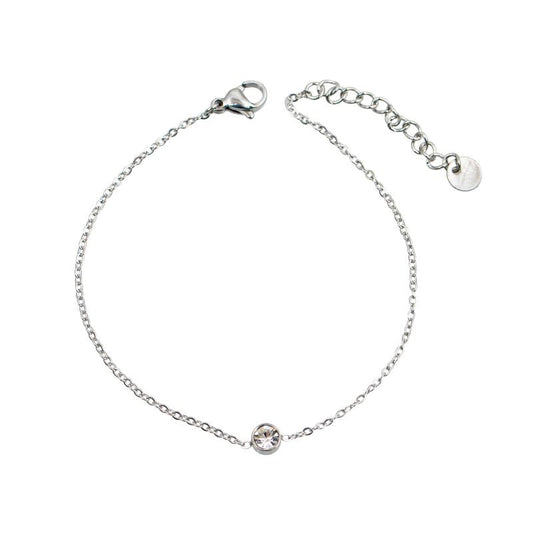 Ασημί βραχιόλι με κρεμαστό κύκλο.