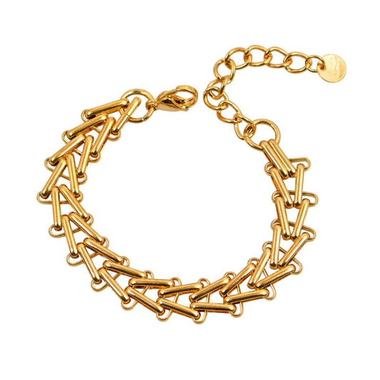 Χρυσό βραχιόλι με γεωμετρική πλέξη και λαμπερό φινίρισμα.