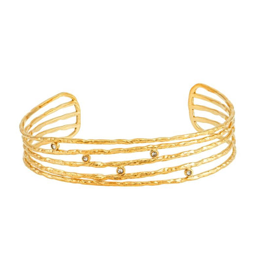 Χρυσό βραχιόλι με πολλαπλές γραμμές και διακοσμητικά ζιργκόν για διαχρονική κομψότητα.