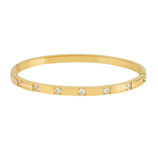 Χρυσό βραχιόλι με γεωμετρικά σχέδια και λαμπερές πέτρες για μοντέρνο και κομψό στυλ.