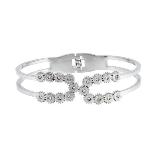 Χρυσό βραχιόλι με στρογγυλές πέτρες και γεωμετρικό σχέδιο για σύγχρονο και εκλεπτυσμένο στυλ.