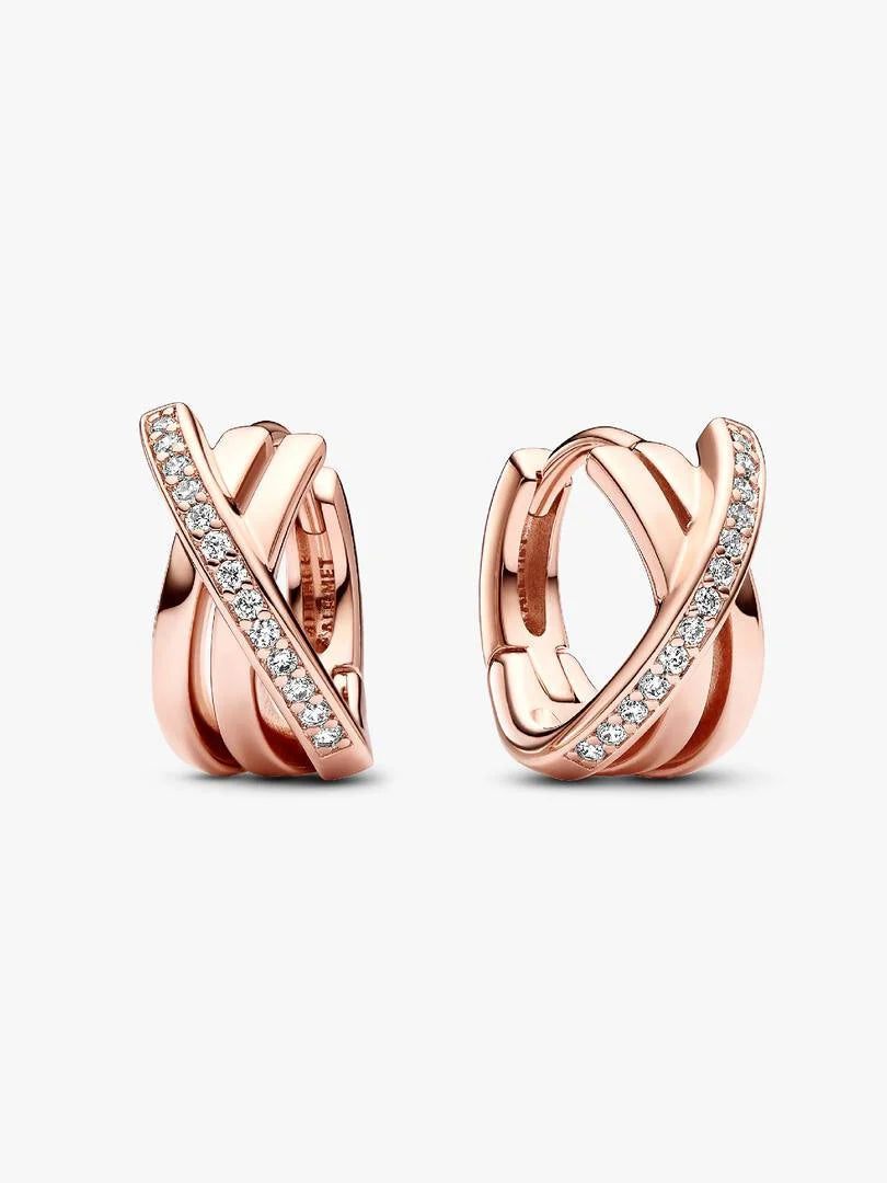 Σκουλαρίκια κρίκοι ροζ χρυσαφι με πέτρες ζιργκόν και crossover σχεδιασμό