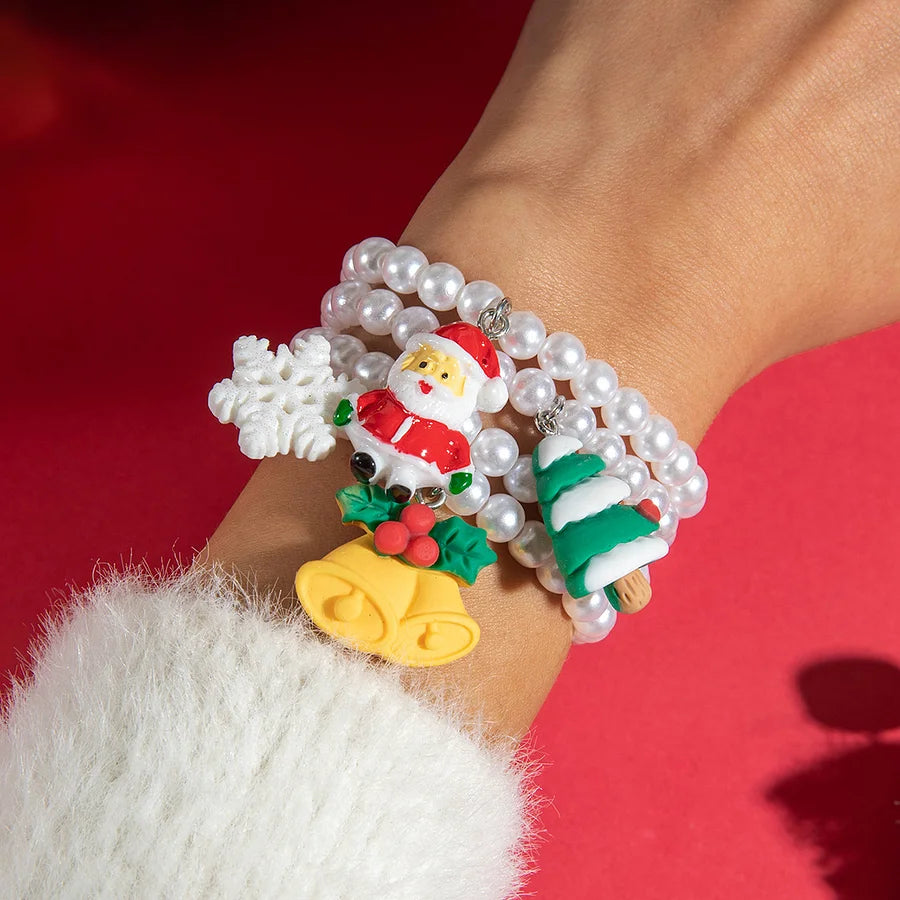 «Γιορτινό χριστουγεννιάτικο βραχιόλι με περλίτσες και charms Άγιο Βασίλη, δέντρο και καμπανούλες»