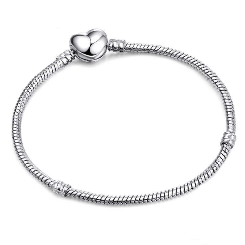 Ασημί βραχιόλι τύπου φίδι με κούμπωμα καρδιά