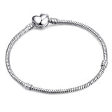 Ασημί βραχιόλι τύπου φίδι με κούμπωμα καρδιά