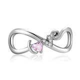 Ασημί charm άπειρο με ροζ καρδιά